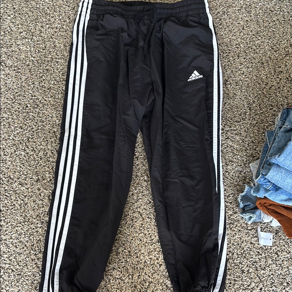 Adidas Black and White Sweatpants with Iconic Stripes